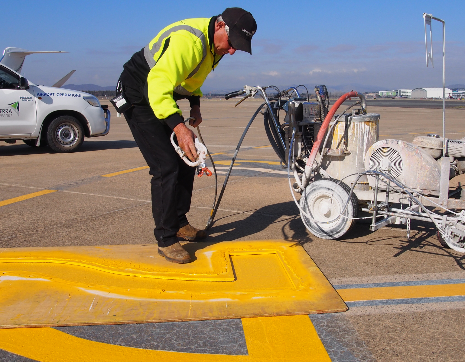 Work Safety officer marking line