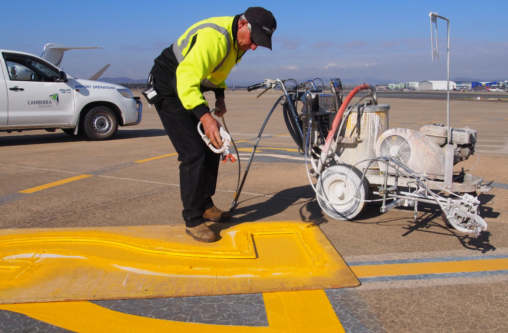 Work Safety officer marking line